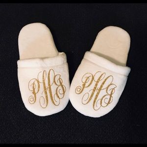 Brand new White slippers.